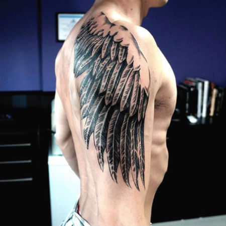 male-dragon-wing-tattoo-on-upper-arm-9403262