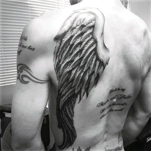 tattoos-of-wings-on-mans-back-5392592